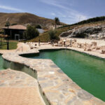 PISCINA TERMAL EL OASIS DE LAS AGUAS - LA MALAHAfoto